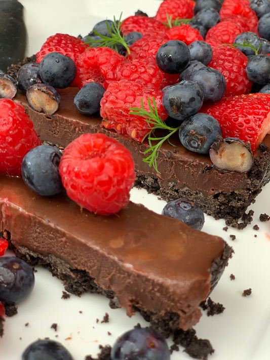 Vegan and Delicious Chocolate Ganache Tart by Niki Angelopoulos from Alkaline Superfoods. Rich, creamy and better than any other chocolate tart you will ever have! 